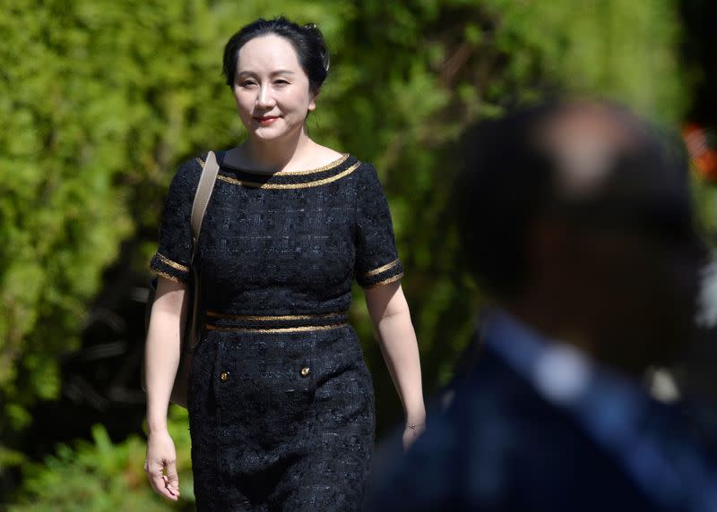 busHuawei Technologies Chief Financial Officer Meng Wanzhou leaves her home to attend a court hearing in Vancouver