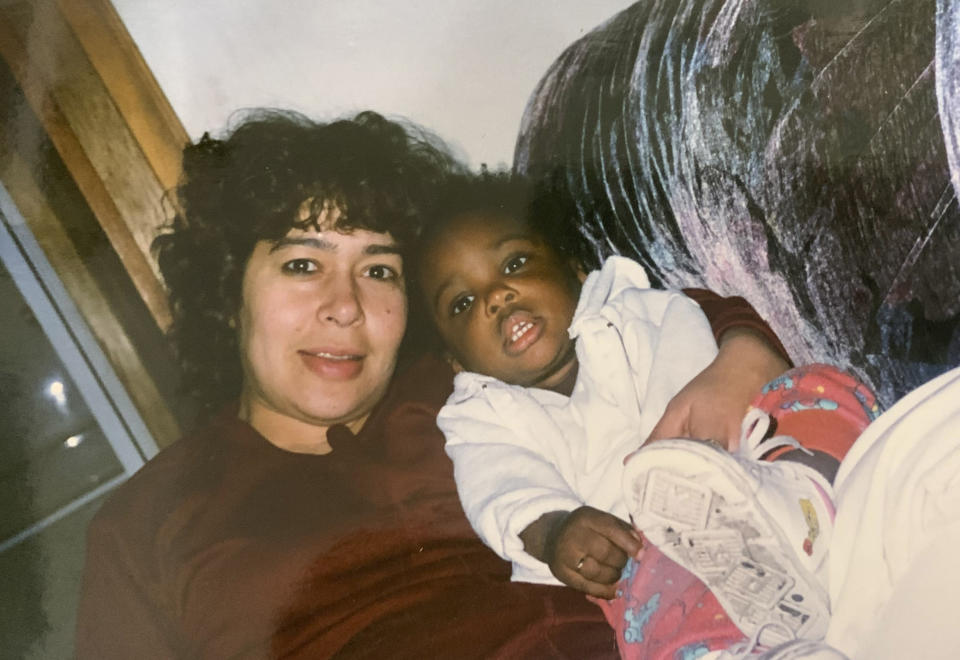 Mexican-born Patricia Palafox, left, holds her American-born daughter, Sarah, in Zacatecas, Mexico, in this updated photo. Sarah Palafox, now 23, is gaining attention as an African American woman who sings regional Mexican music. The 23-year-old has sparked many emotions following a series of viral video performances on social media. (Silent Giant Entertainment via AP)