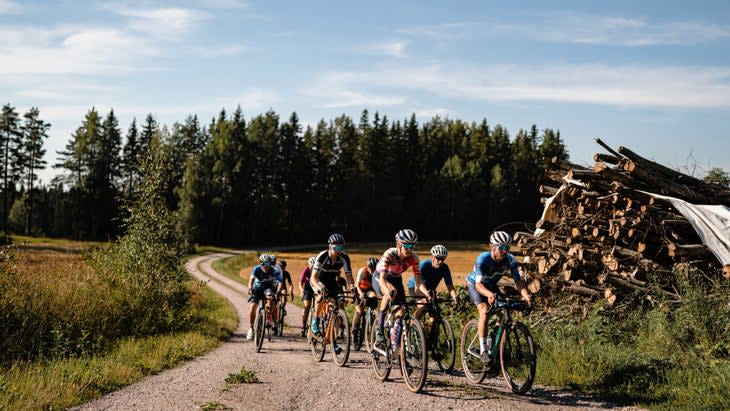 <span class="article__caption">Bottas and Cromwell lead a group of cyclists in Finland. </span> (Photo: FNLD GRVL)