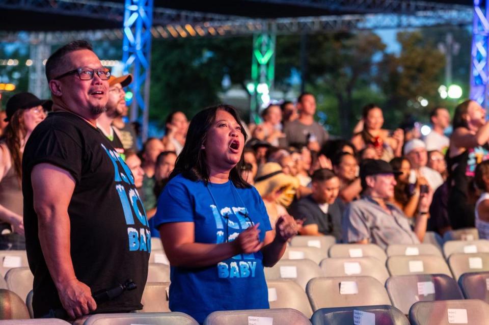 Tom Nguyen and Maricar Rogen rock matching Ice Ice Baby T-shirts for the Vanilla Ice concert on the Golden 1 Stage during the California State Fair at Cal Expo on Friday.