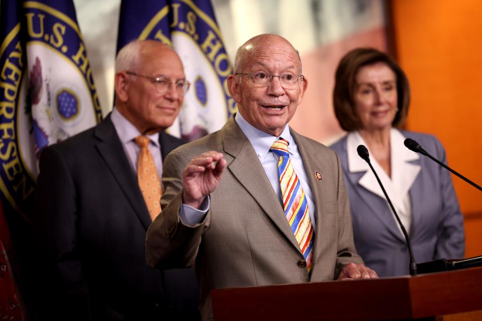 Rep. Peter DeFazio, D-Ore., speaks alongside Rep. Paul Tonko, D-N.Y., and Speaker of the House Nancy Pelosi, D-Calif., at a press conference on the INVEST in America Act on June 30 in Washington, D.C.