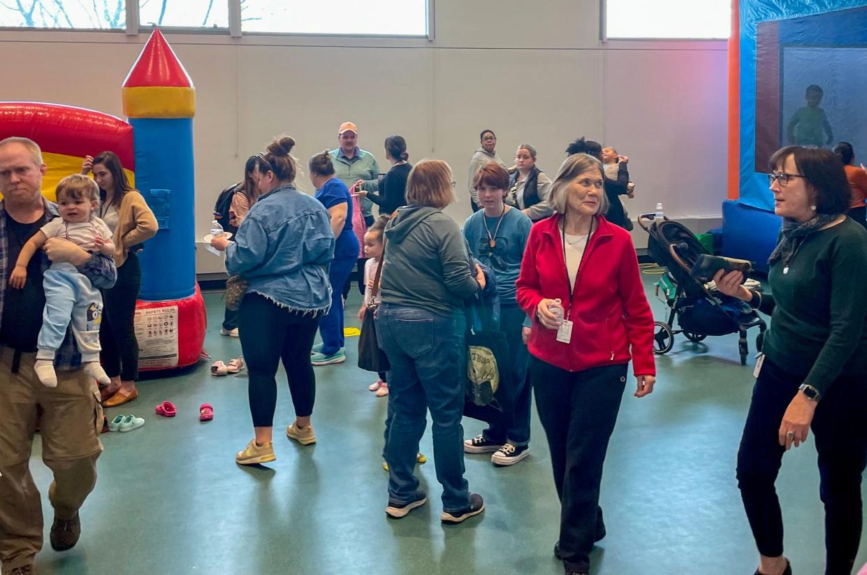 “We weren’t expecting this many people,” said Jason Homer. Two bounce castles along with cupcakes were set up in the library’s Saxe Room following the announcement.