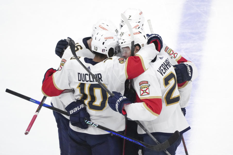 Florida Panthers center Carter Verhaeghe (23) celebrates his goal with teammates during the second period, of Game 1 of an NHL hockey Stanley Cup second-round playoff series against the Toronto Maple Leafs in Toronto, Tuesday, May 2, 2023. (Chris Young/The Canadian Press via AP)