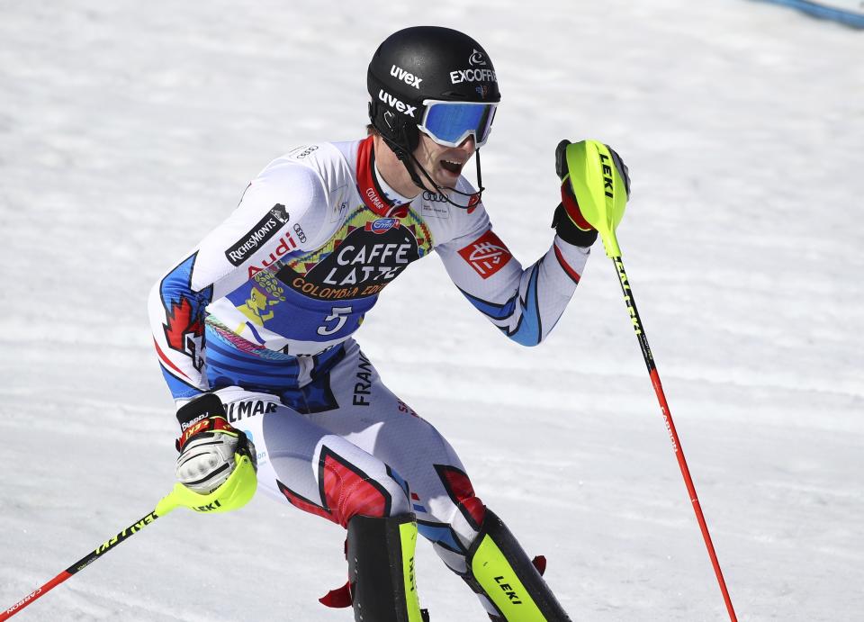 France's Clement Noel celebrates after winning a men's alpine ski slalom, in Soldeu, Andorra, Sunday, March 17, 2019. (AP Photo/Alessandro Trovati)