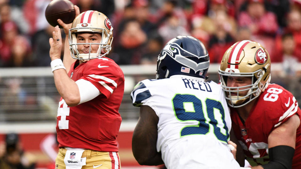 San Francisco 49ers Quarterback Nick Mullens (4) looks to pass during their game between the Seattle Seahawks. (Photo by Cody Glenn/Icon Sportswire via Getty Images)