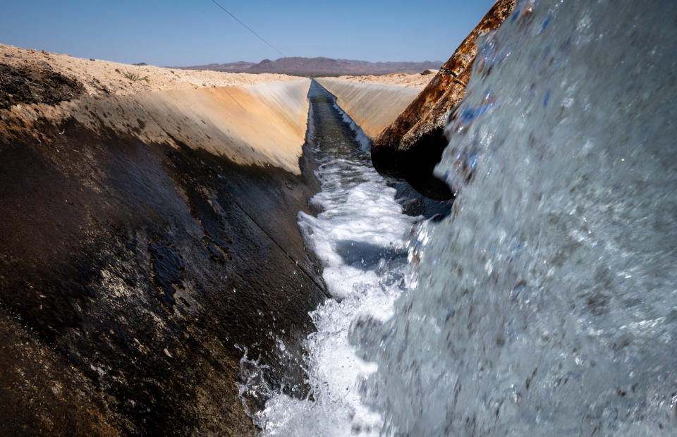 Ground water is used to irrigate an alfalfa field, April 7, 2022, at Fondomonte's Butler Valley Ranch near Bouse.