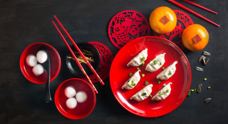 Fruit and dumplings are also symbols of luck and prosperity (Getty)