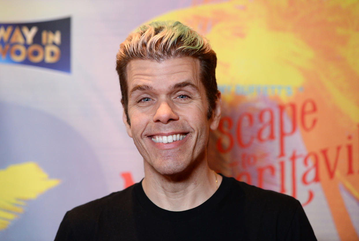 HOLLYWOOD, CALIFORNIA - FEBRUARY 18: Perez Hilton arrives at Jimmy Buffett's 