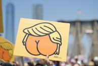 <p>Protestors cross the Brooklyn Bridge during a march against the separation of immigrant families, on June 30, 2018 in New York. (Photo: Eduardo Munoz Alvarez/AFP/Getty Images) </p>