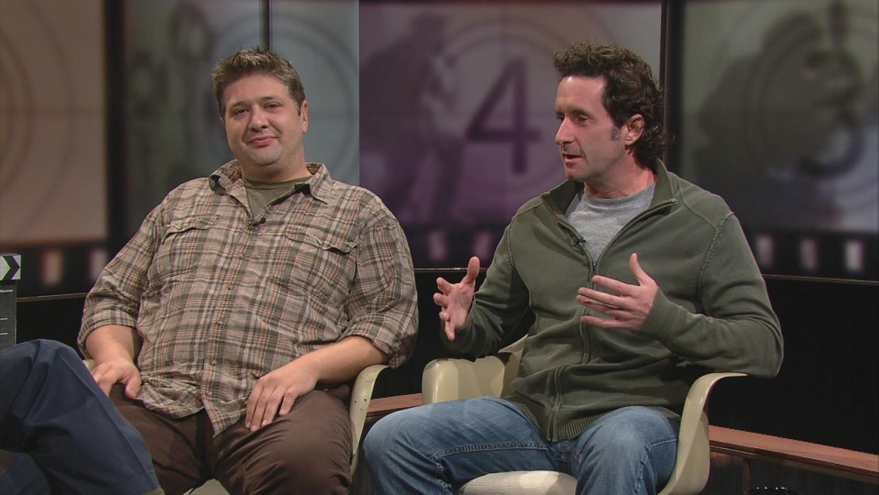 
Lance Barber, left, sits with director/writer Pete Schwaba as they discuss the 2005 movie “Godfather of Green Bay.”
