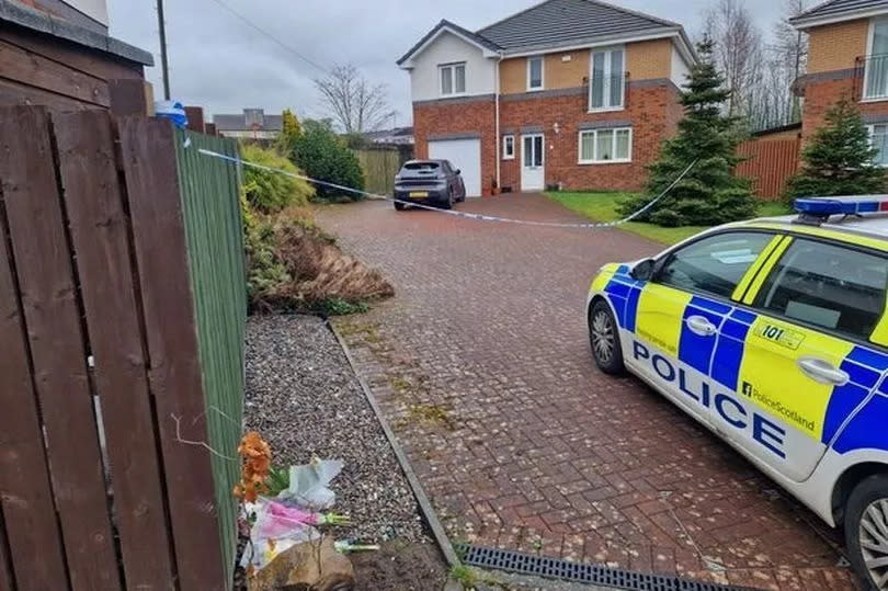 Pictures of the scene outside the house in Fishcross where the murder took place -Credit:Stirling Observer