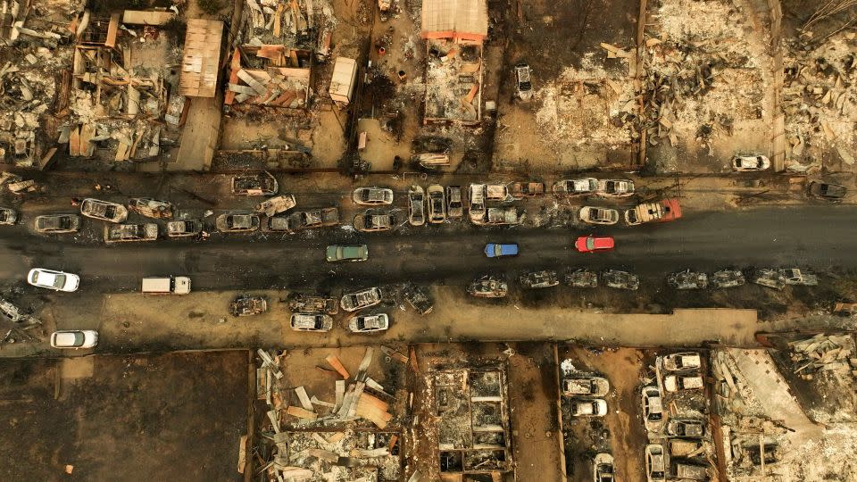 Aerial view of burned vehicles in the El Olivar commune. - Javier Torres/AFP/Getty Images