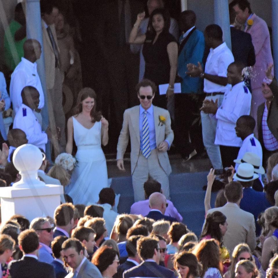 Prince Harry and Meghan Markle put on an affectionate display as they attend wedding in Jamaica