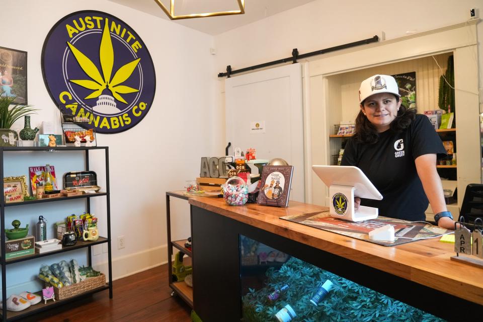 Employee Aleida Hernandez discusses the cannabis products for sale at Austinite Cannabis Co. on Wednesday, April 17, 2024.