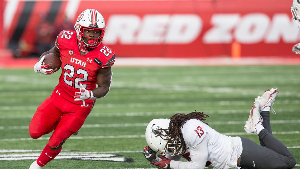 Seen here, Ty Jordan in action for Utah's college team.