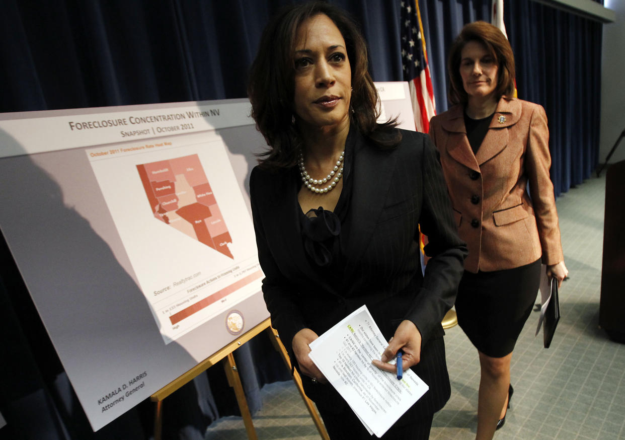 LOS ANGELES, CALIF. - DEC. 6, 2011. California Attorney General Kamala D. Harris , left, and  Nevada Attorney General Catherine Cortez Masto conclude a press conference Tuesday, Dec. 6, 2011, where they announced a joint investigation alliance to assist homeowners who have been harmed by misconduct and fraud in the mortgage industry. The cooperative venture will combine the resources of both states' civil and criminal enforcement teams, which will share strategies, information and evidence as each office pursues independent criminal prosecutions.  (Photo by Luis Sinco/Los Angeles Times via Getty Images)