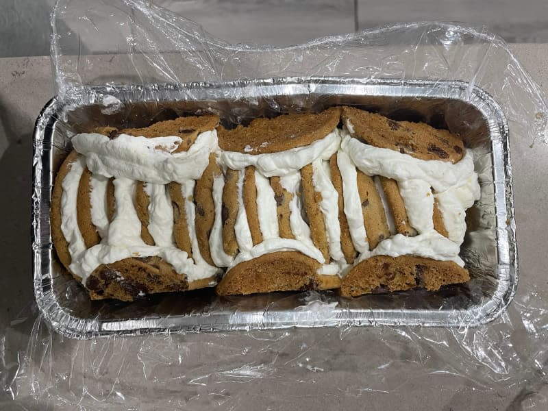 Cookies and cream in baking pan to make yuletide log.