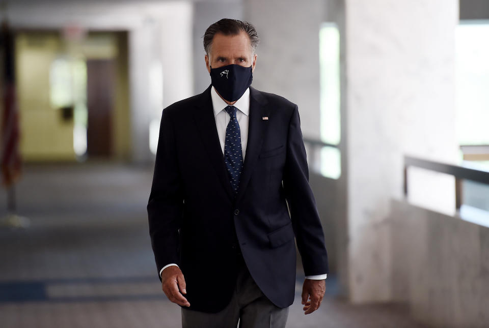 US Senator Mitt Romney, Republican of Utah, heads into a Republican policy lunch on Capitol Hill in Washington on July 21, 2020. (Photo by Olivier DOULIERY / AFP) (Photo by OLIVIER DOULIERY/AFP via Getty Images)