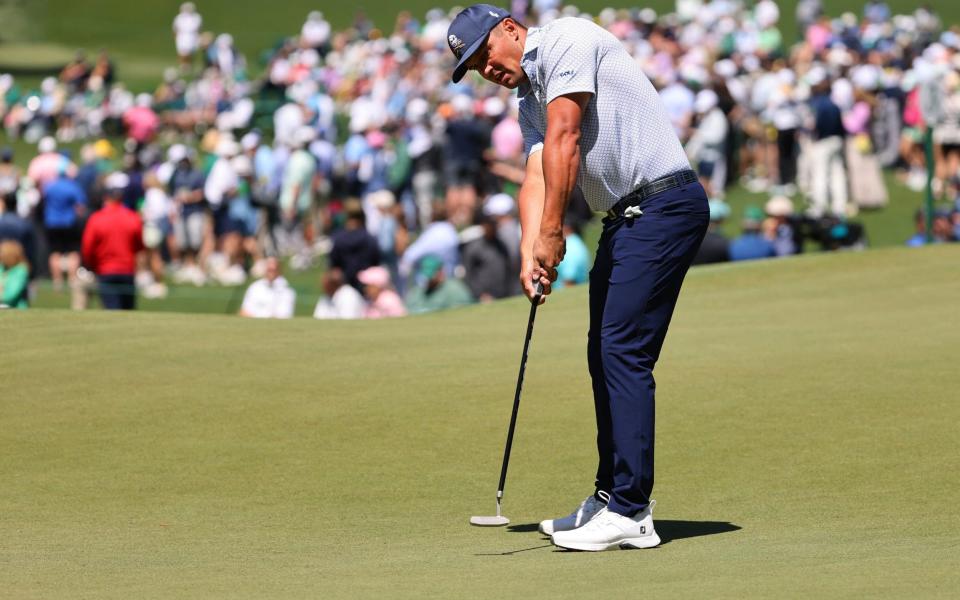 Bryson DeChambeau of the U.S. holes a birdie putt on the 7th green