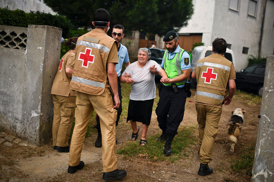 Red Cross and police evacuating homes