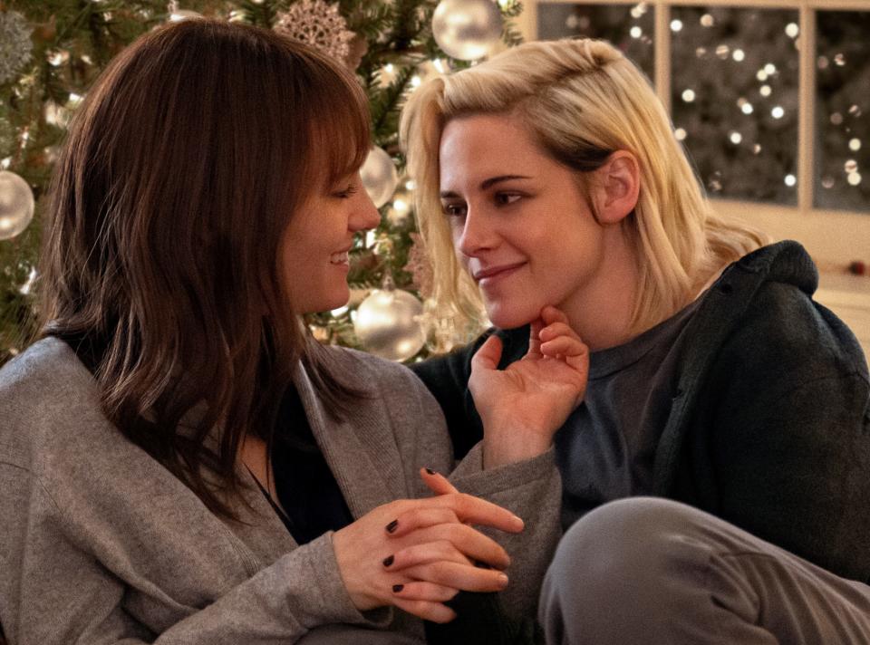 Abby (Kristen Stewart, right) plans to propose to girlfriend Harper (Mackenzie Davis), then finds out she's kept their relationship secret from her family in the holiday romantic comedy "Happiest Season."