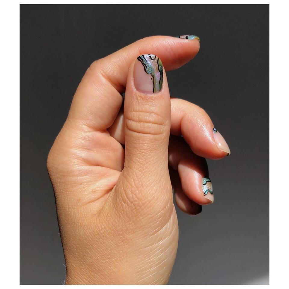 This shell-inspired nail art is simply stunning. Try your hand at re-creating it with <a href="https://shop-links.co/1716911719815190164" rel="nofollow noopener" target="_blank" data-ylk="slk:Essie's Let It Ripple collection;elm:context_link;itc:0;sec:content-canvas" class="link ">Essie's Let It Ripple collection</a>.