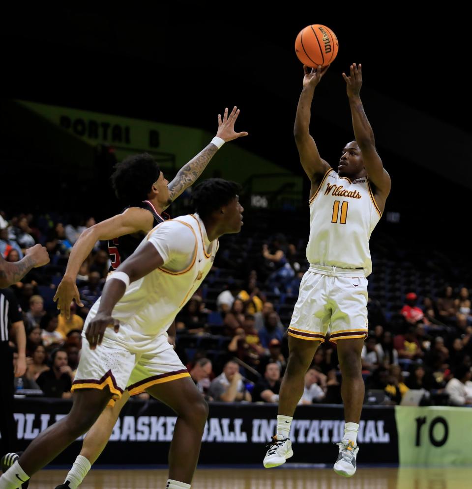 Bethune Cookman’s Dhashon Dyson (11) shoots the ball against Arkansas State during the ro College Basketball Invitational held at Ocean Center on Saturday, March 23, 2024.