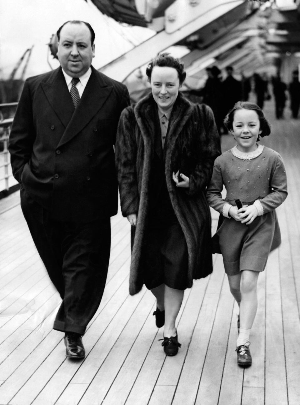 Alfred Hitchcock with his wife Alma Reville and their daughter Pat Hitchcock aboard the Queen Mary at Southampton, before departure to America in March 1939 - AFP/GettyImages