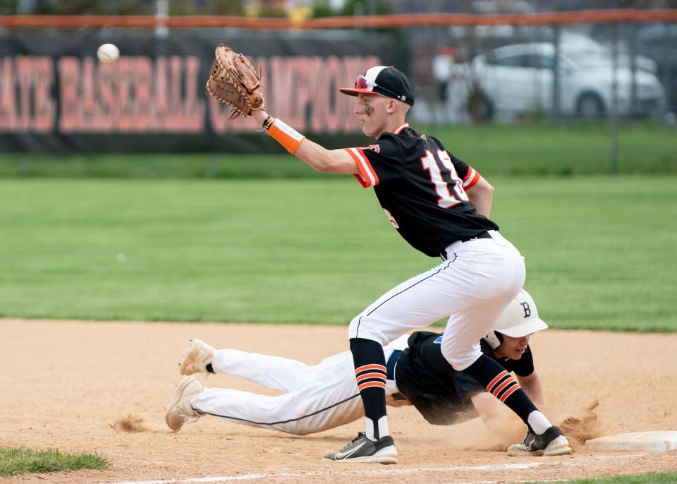 Pennsbury's Sam Labrecque waits for the pickoff throw during Tuesday's win over Bensalem.