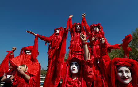 Climate change activists attend the Extinction Rebellion protest on Waterloo Bridge in London, Britain April 20, 2019. REUTERS/Simon Dawson