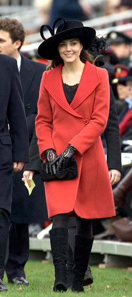 <div class="caption-credit"> Photo by: Getty</div>Kate applauded her then-boyfriend William at his graduation ceremony at the Royal Military Academy in 2006 wearing a red dress coat and black wide-rimmed hat. <br>