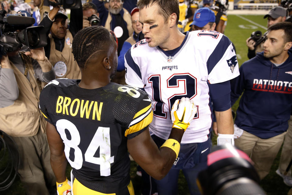 New England Patriots quarterback Tom Brady (12) talks with Pittsburgh Steelers wide receiver Antonio Brown (84) on the field after an NFL football game in Pittsburgh, Sunday, Oct. 23, 2016. (AP Photo/Jared Wickerham)