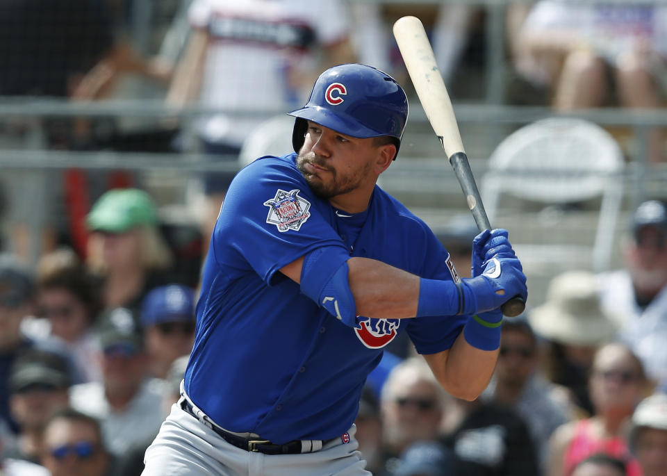 FILE - In this Friday, March 15, 2019 file photo, Chicago Cubs' Kyle Schwarber bats during a spring training baseball game against the Chicago White Sox in Glendale, Ariz. Kyle Schwarber and Albert Almora Jr. became free agents Wednesday, Dec. 2, 2020 when the Chicago Cubs declined to offer contracts to two key players from their historic 2016 World Series championship. (AP Photo/Sue Ogrocki, File)