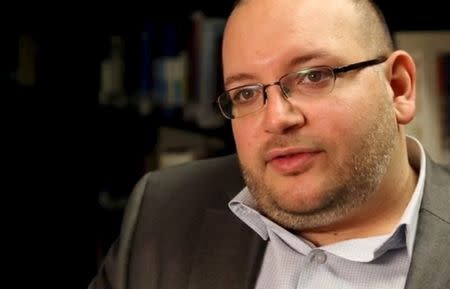 Washington Post reporter Jason Rezaian speaks in the newspaper's offices in Washington, DC in a November 6, 2013 file photo provided by The Washington Post. REUTERS/Zoeann Murphy/The Washington Post/Handout via Reuters