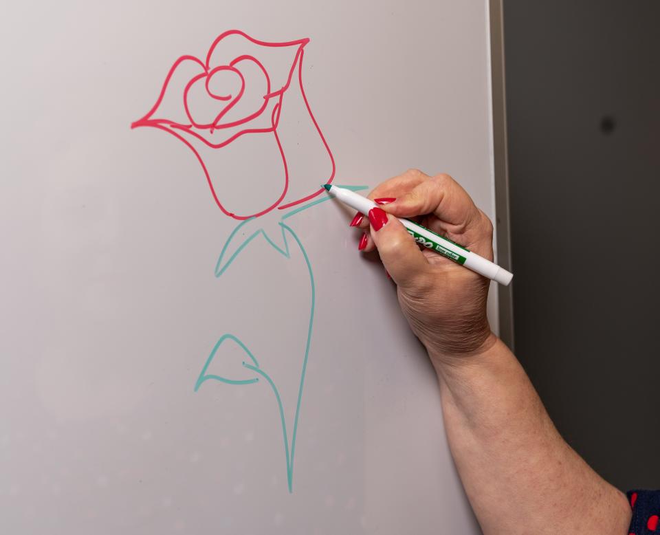 Rhonda Sherbin would leave her rose on chalkboards and whiteboards, on slips of paper and yearbooks.