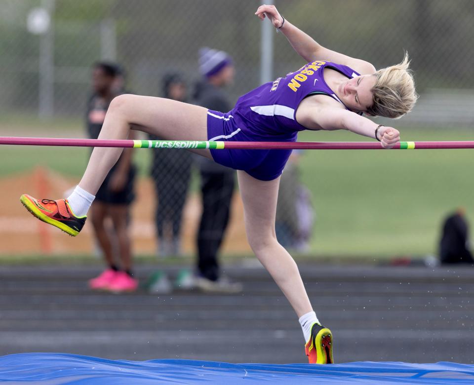 Jackson's Abra Manofsky won a Division I regional title in the girls high jump Wednesday night at Austintown Fitch.