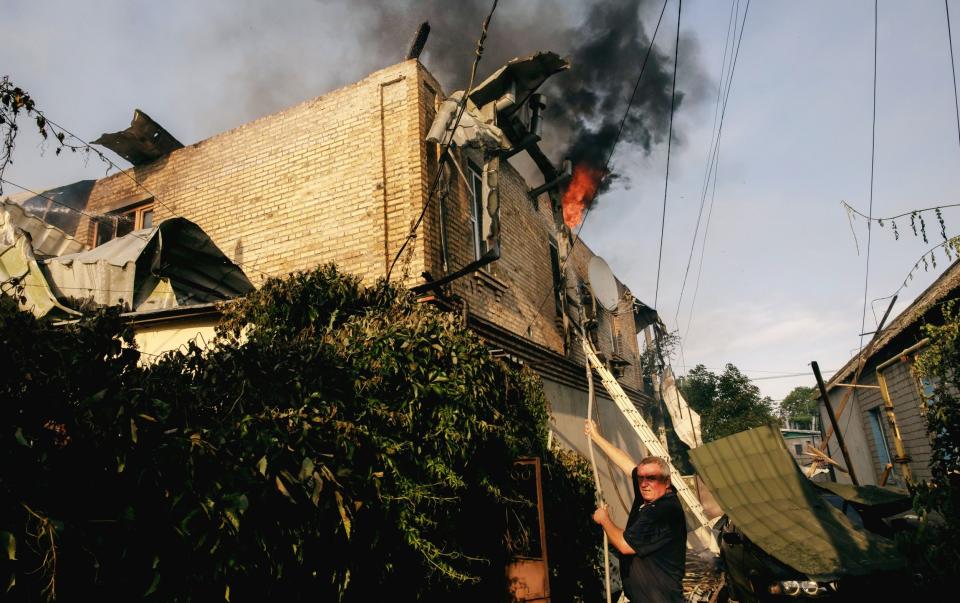 A residential house was hit by Russian shelling in Kherson - Roman Pilipey/Getty Images