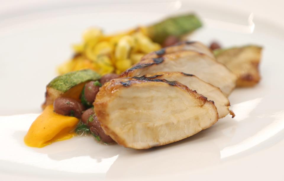 A dish made with Good Meat's cultivated chicken is displayed on a white plate.