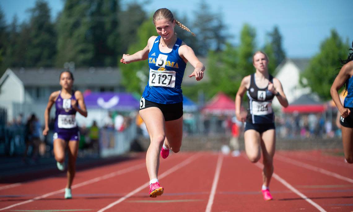 Tahoma’s Brooke Lynn glides to a state title in the 4A girls 200 meters during the final day of the WIAA state track and field championships at Mount Tahoma High School in Tacoma, Washington, on Friday, May 26, 2023. Tony Overman/toverman@theolympian.com