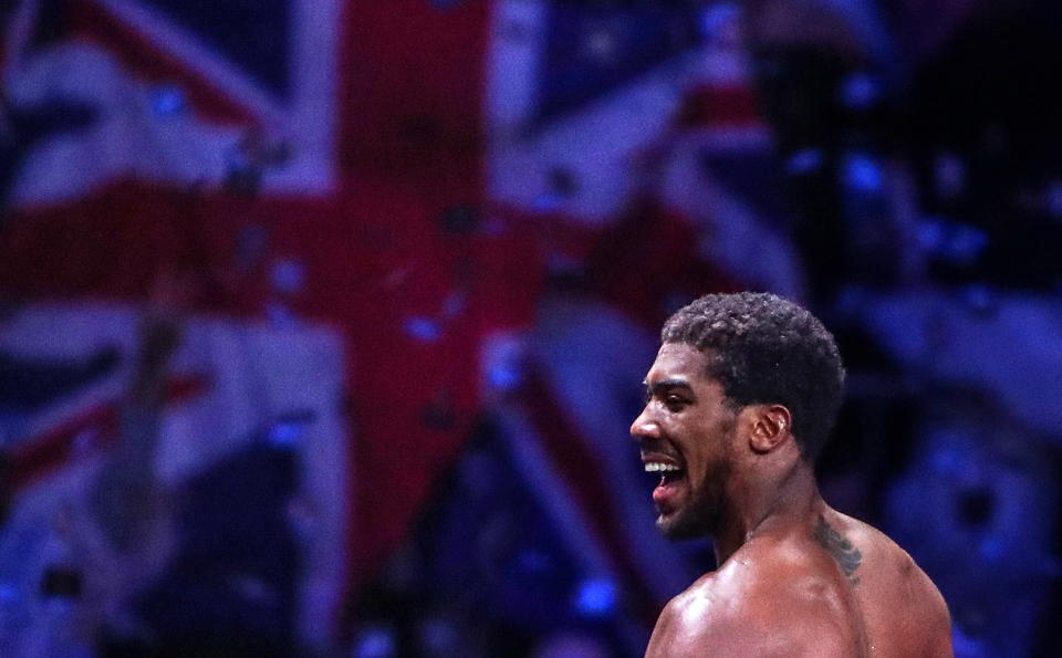 SAUDI ARABIA - DECEMBER 7, 2019: British boxer Anthony Joshua celebrates winning a bout against his American rival Andy Ruiz Jr and regaining his IBO, WBA Super, IBF and WBO World Heavy Titles at Diriyah Arena outside Riyadh. Valery Sharifulin/TASS (Photo by Valery Sharifulin\TASS via Getty Images)