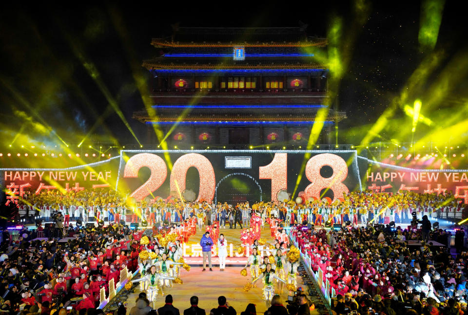 People celebrate the New Year during a countdown event at Yongdingmen Gate in Beijing, China on January 1, 2018. (Photo: Jason Lee / Reuters)