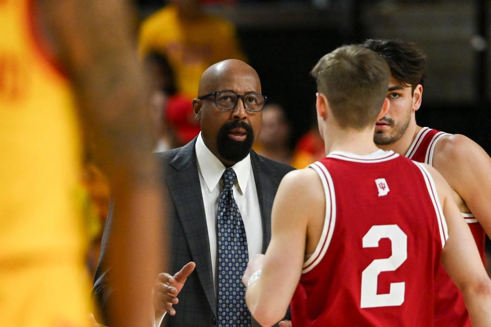 Mar 3, 2024; College Park, Maryland, USA; Indiana Hoosiers head coach Mike Woodson speaks with guard Gabe Cupps (2) during the first half against the Maryland Terrapins at Xfinity Center. Mandatory Credit: Tommy Gilligan-USA TODAY Sports