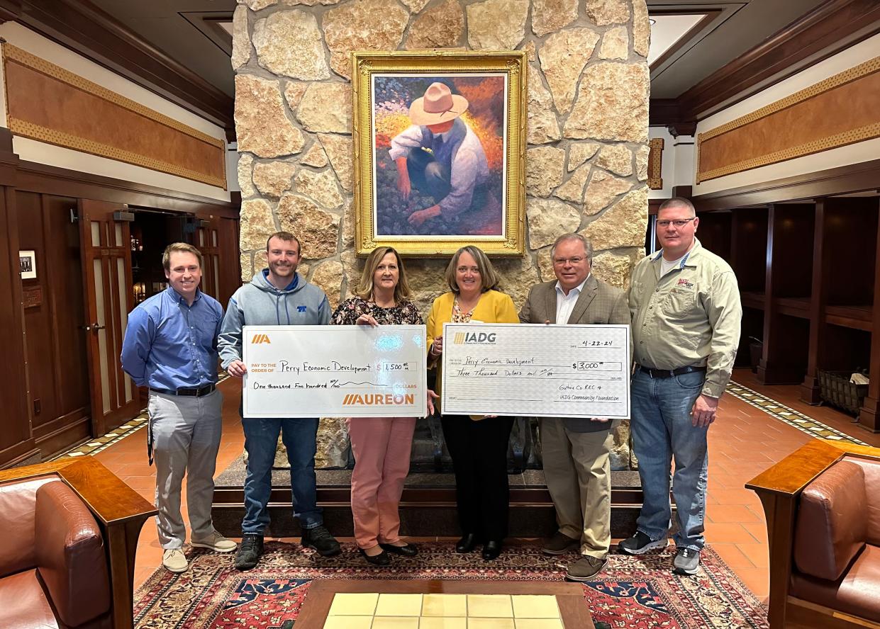 From left, Ethan Pitt, Iowa Area Development Group/VP Ripple Effect; Jackson VanKirk, PED board member; Debra Lucht, Minburn Communications CEO/GM and PED board member; Carey Stover, Aureon Chief Experience Officer; Bruce Nuzum, Iowa Area Development Group President/CEO; Kyle Baxter, PED board member.