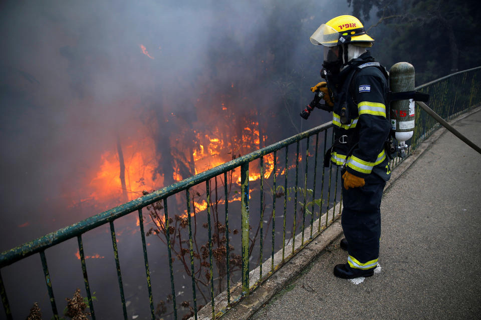 Massive wildfires tear across Israel