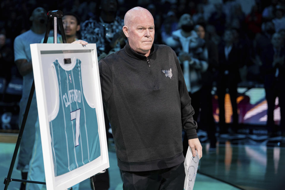 Charlotte Hornets head coach Steve Clifford is honored before an NBA basketball game against the Dallas Mavericks Tuesday, April 9, 2024, in Charlotte, N.C. (AP Photo/Jacob Kupferman)