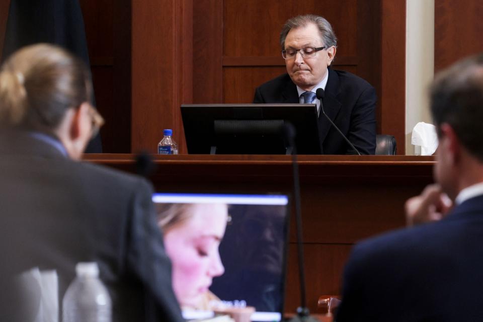 Bryan Neumeister, a forensic and metadata specialist testifies in the courtroom during actor Johnny Depp’s defamation trial against his ex-wife Amber Heard (POOL/AFP via Getty Images)