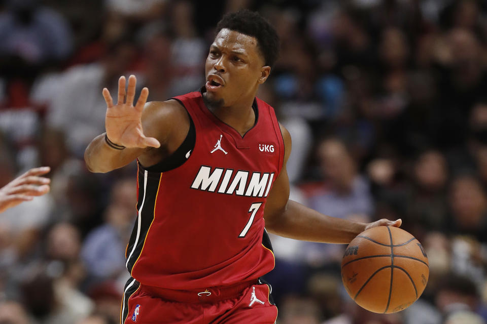 MIAMI, FLORIDA - OCTOBER 21: Kyle Lowry #7 of the Miami Heat dribbles up the court against the Milwaukee Bucks at FTX Arena on October 21, 2021 in Miami, Florida. NOTE TO USER: User expressly acknowledges and agrees that, by downloading and or using this photograph, User is consenting to the terms and conditions of the Getty Images License Agreement. (Photo by Michael Reaves/Getty Images)