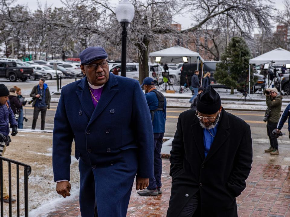 Celina Charles and Larry Jones of Purposed for the People arrive at the church.