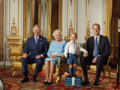 <p>Prince George stole the show with his matching socks and shorts in this royal portrait alongside Queen Elizabeth II, Prince Charles and Prince William. [Photo: Getty] </p>