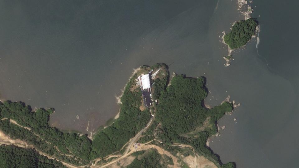 This satellite picture by Planet Labs PBC shows activity at a newly built launch pad at the Sohae Satellite Launching Station near Tongchang-ri, North Korea, Tuesday, May 30, 2023. (Planet Labs PBC via AP)